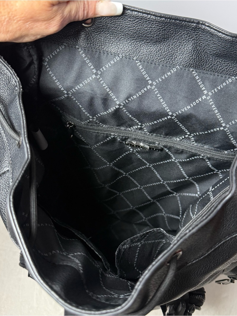 Steve Madden Black Pebbled Faux Leather Drawstring Backpack with Chain Trim - Picture 5 of 8